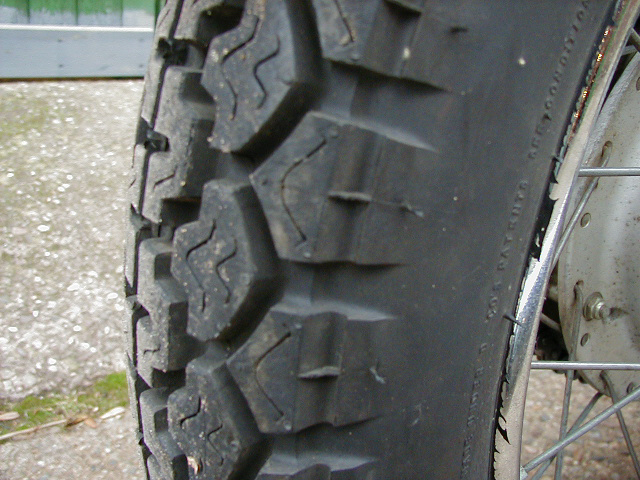 Un-worn original rear tyre
